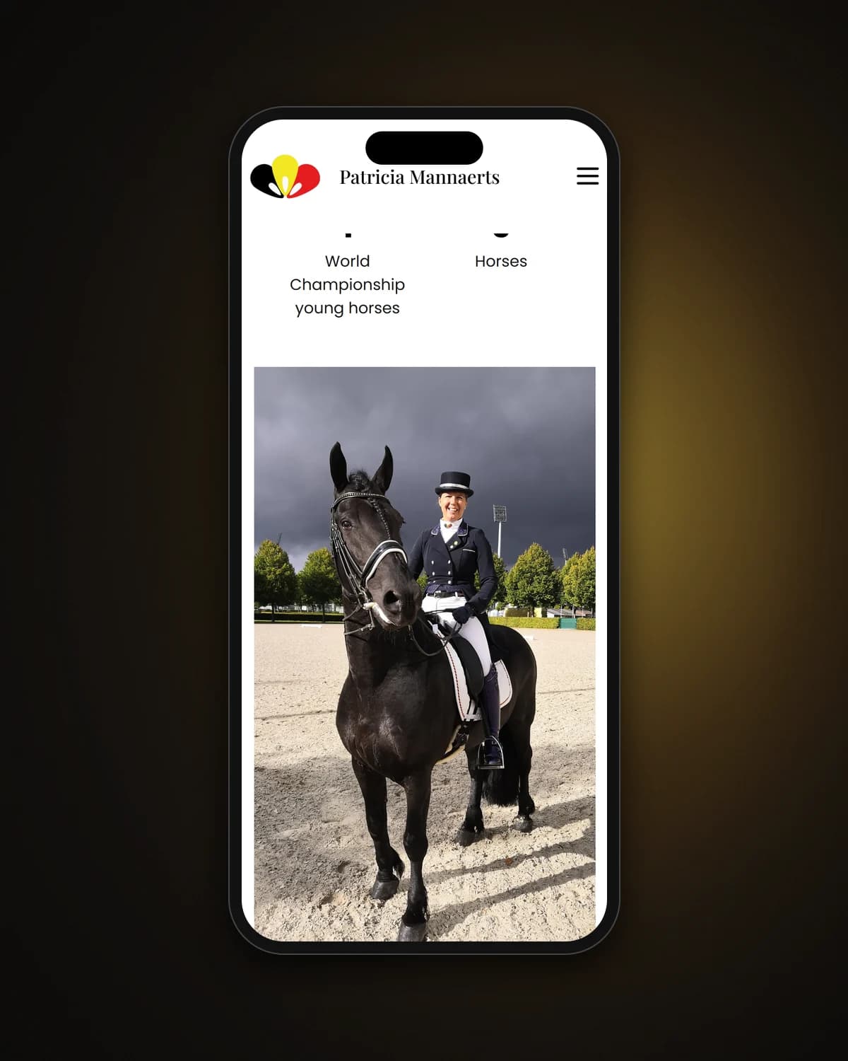 Patricia with a Friesian stallion on a phone